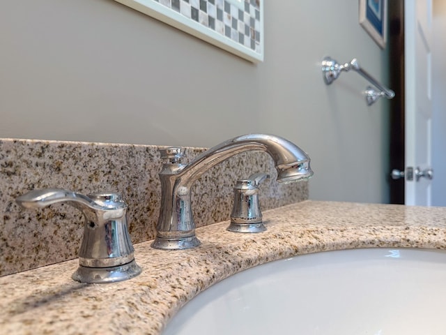 510 Plum St, Cape Charles, VA 23310 - room details with backsplash and vanity