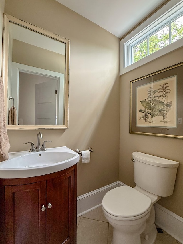 510 Plum St, Cape Charles, VA 23310 - bathroom with toilet, tile patterned flooring, vanity, and baseboards