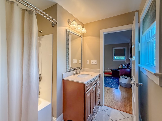 510 Plum St, Cape Charles, VA 23310 - full bathroom featuring tile patterned flooring, shower / bath combo, vanity, and baseboards