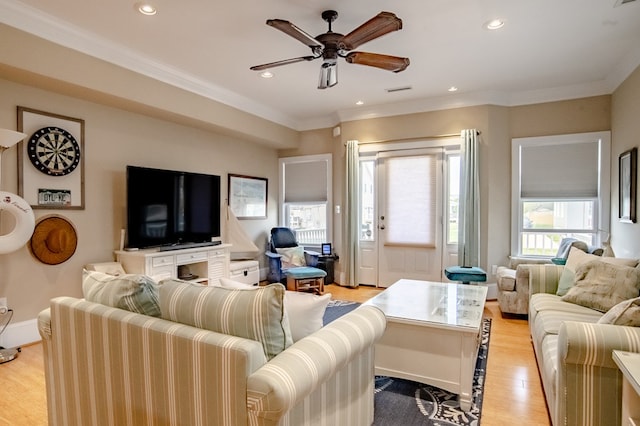 510 Plum St, Cape Charles, VA 23310 - living room with recessed lighting, light wood-type flooring, visible vents, a ceiling fan, and crown molding