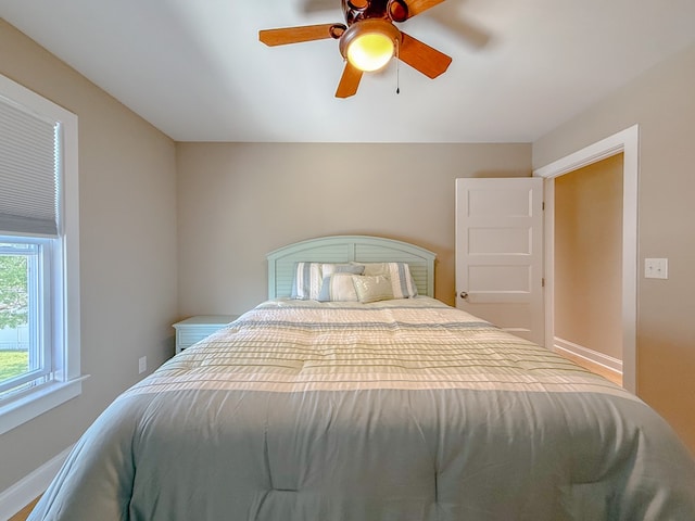510 Plum St, Cape Charles, VA 23310 - bedroom featuring a ceiling fan and baseboards