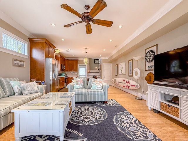 510 Plum St, Cape Charles, VA 23310 - living area featuring a ceiling fan, ornamental molding, a wealth of natural light, and light wood-style floors