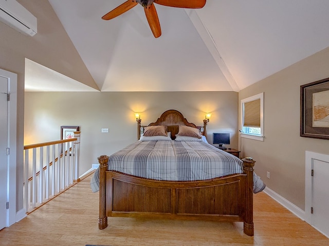 510 Plum St, Cape Charles, VA 23310 - bedroom featuring a wall unit AC, light wood-style floors, ceiling fan, baseboards, and vaulted ceiling with beams
