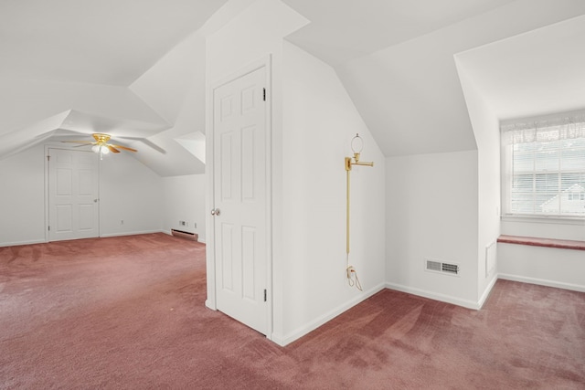 bonus room with light carpet, lofted ceiling, and ceiling fan