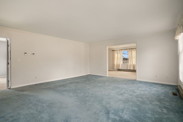 carpeted spare room with ornamental molding