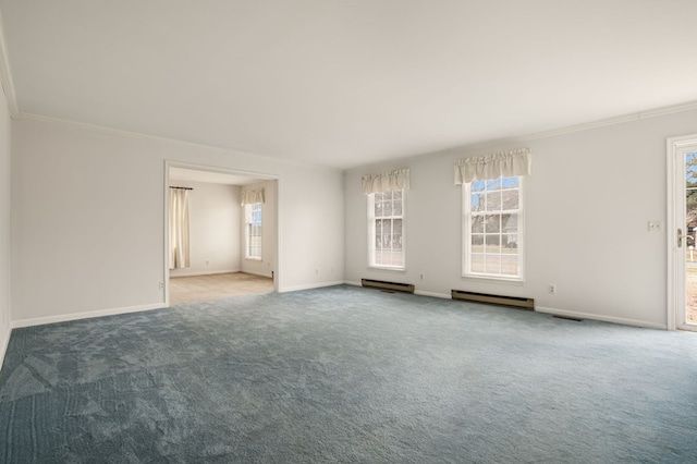 carpeted empty room with baseboard heating and crown molding