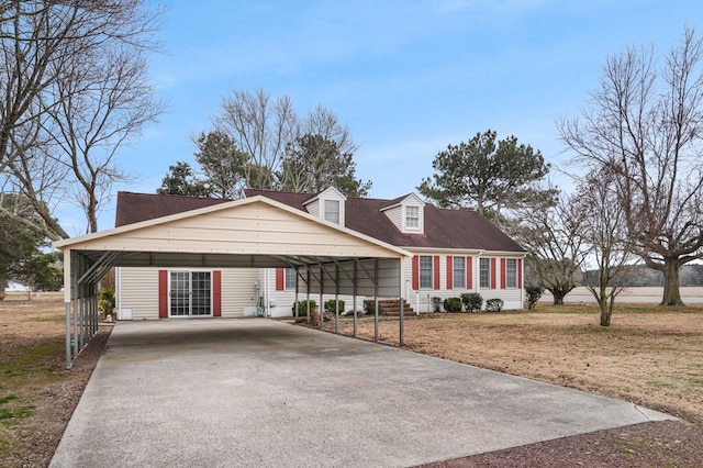 cape cod home with a front yard