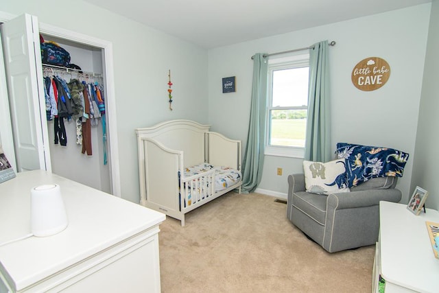6545 Occohannock Neck Rd, Exmore, VA 23350 - bedroom featuring a closet, baseboards, and light colored carpet