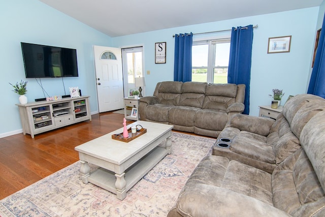 6545 Occohannock Neck Rd, Exmore, VA 23350 - living room with a wealth of natural light, baseboards, lofted ceiling, and wood finished floors