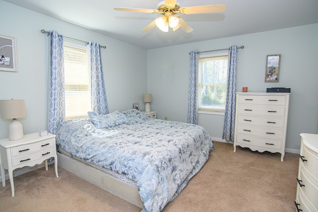 6545 Occohannock Neck Rd, Exmore, VA 23350 - bedroom with light carpet and ceiling fan