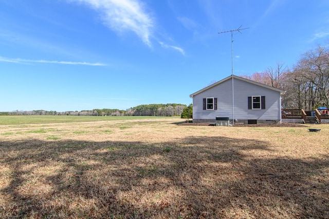6545 Occohannock Neck Rd, Exmore, VA 23350 - exterior space featuring crawl space, central AC unit, a wooden deck, and a yard