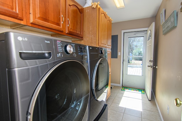 6545 Occohannock Neck Rd, Exmore, VA 23350 - laundry room featuring independent washer and dryer, electric panel, cabinet space, light tile patterned floors, and baseboards