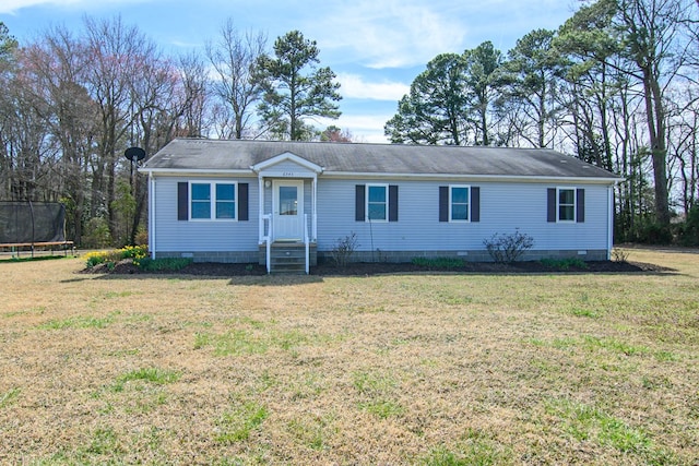 6545 Occohannock Neck Rd, Exmore, VA 23350 - ranch-style house with crawl space, a trampoline, and a front lawn