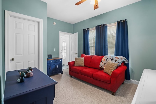 living room featuring ceiling fan