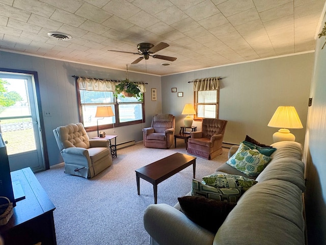 3434 Willow St, Chincoteague, VA 23336 - living area with a baseboard radiator, carpet, ornamental molding, and ceiling fan