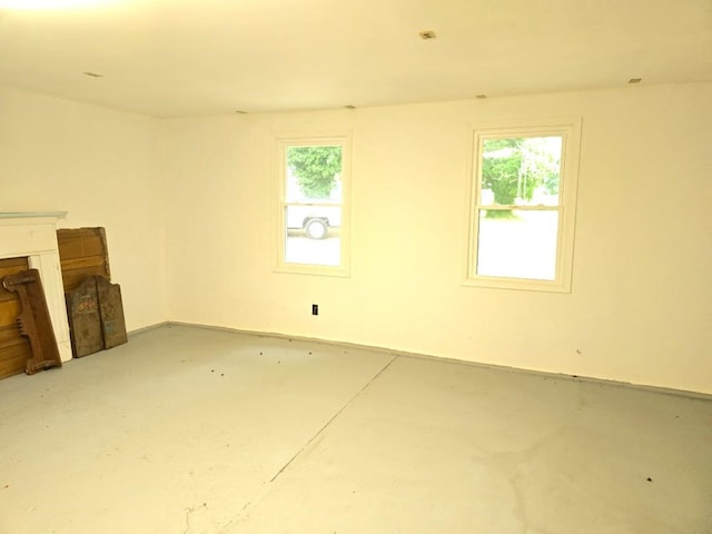 30423 Bobtown Rd, Pungoteague, VA 23421 - unfurnished living room featuring concrete flooring