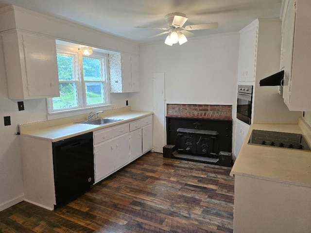 30423 Bobtown Rd, Pungoteague, VA 23421 - kitchen featuring black appliances, exhaust hood, white cabinets, dark wood-style floors, and light countertops