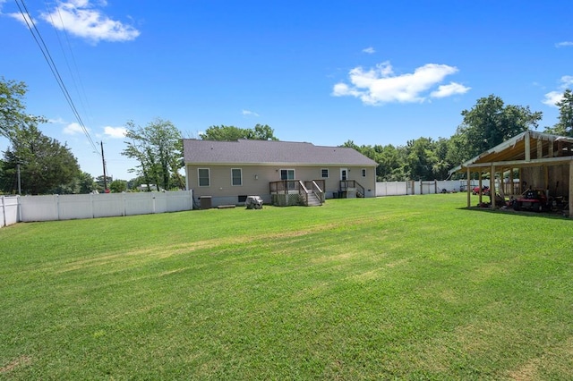 view of yard with a carport