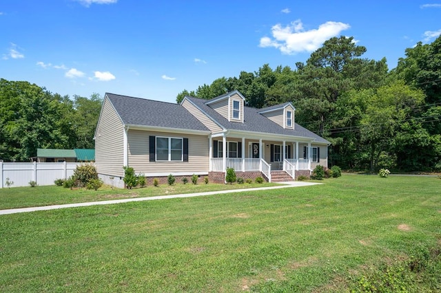 cape cod house with a porch and a front yard