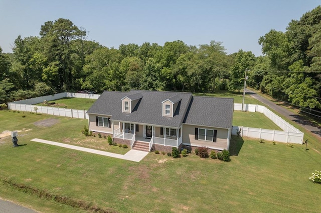 view of front of home with a front lawn and covered porch