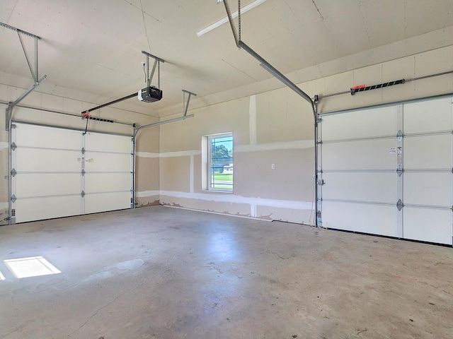 garage featuring a garage door opener