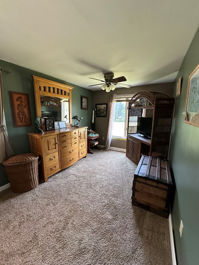 30191 Back Creek Rd, Hacksneck, VA 23358 - carpeted living room with ceiling fan, baseboards, and an office area