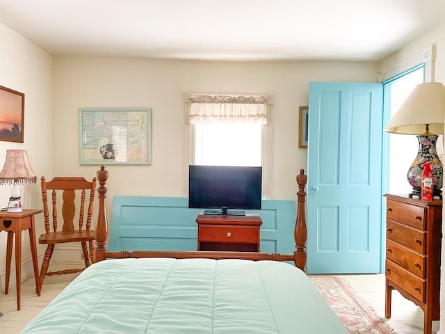 bedroom with multiple windows