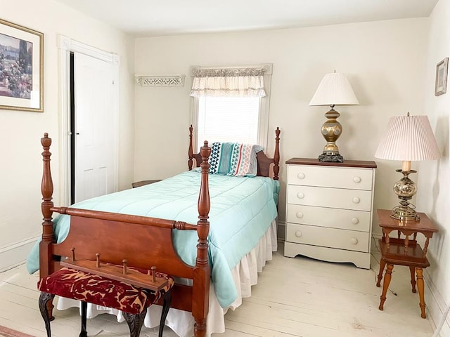 bedroom with light wood-type flooring