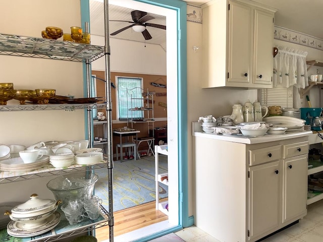 kitchen featuring ceiling fan