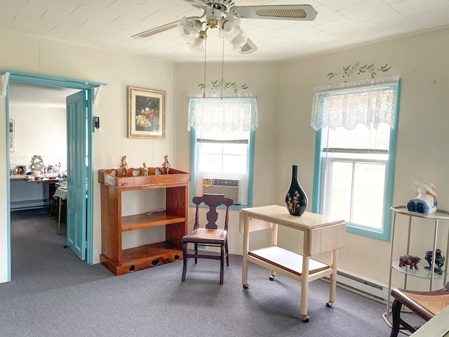 living area featuring cooling unit, ceiling fan, and carpet flooring