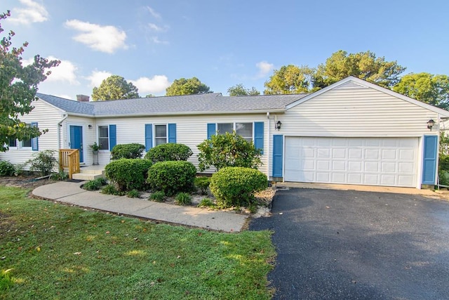 single story home with a garage