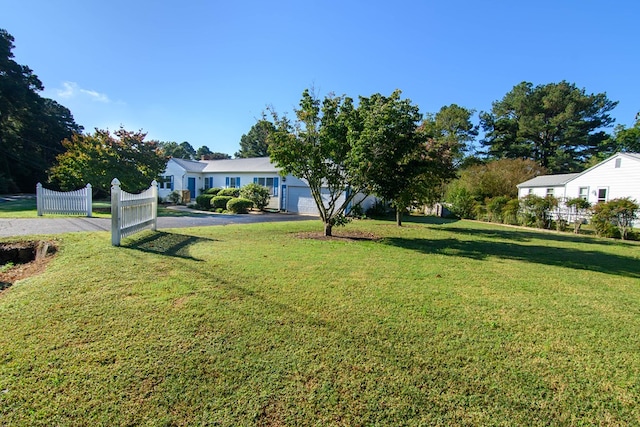 view of yard with a garage