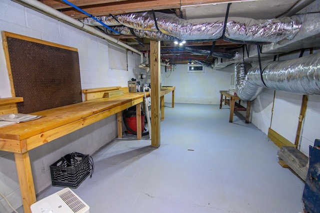 basement with a workshop area