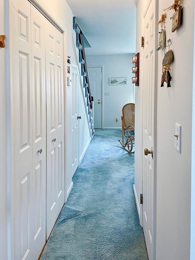 corridor featuring carpet floors