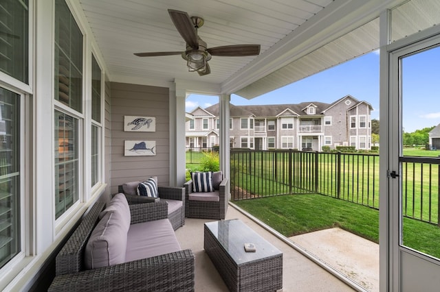 199 Old Course Loop, Cape Charles, VA 23310 - sunroom / solarium with a residential view, ceiling fan, and a healthy amount of sunlight