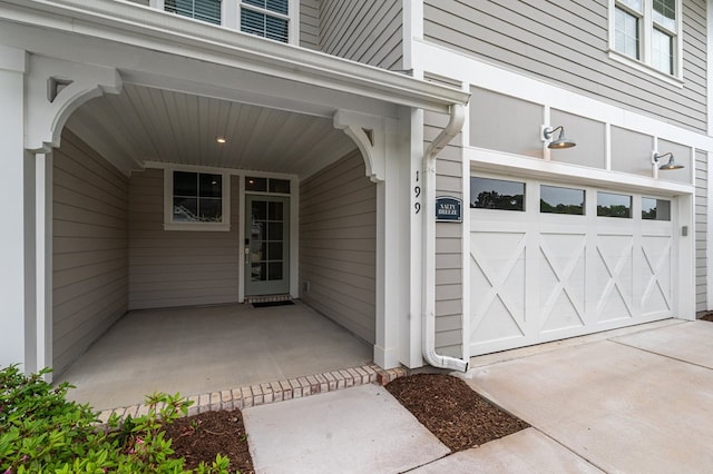 199 Old Course Loop, Cape Charles, VA 23310 - property entrance with driveway and a garage