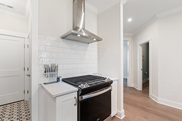 199 Old Course Loop, Cape Charles, VA 23310 - kitchen featuring wall chimney exhaust hood, ornamental molding, and range with gas stovetop