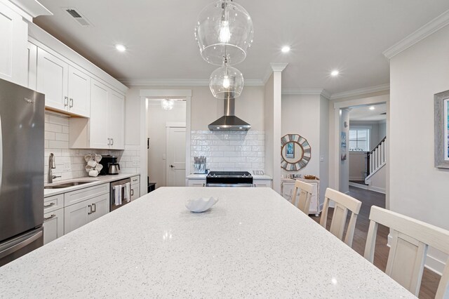 199 Old Course Loop, Cape Charles, VA 23310 - kitchen featuring tasteful backsplash, visible vents, stainless steel appliances, and a sink