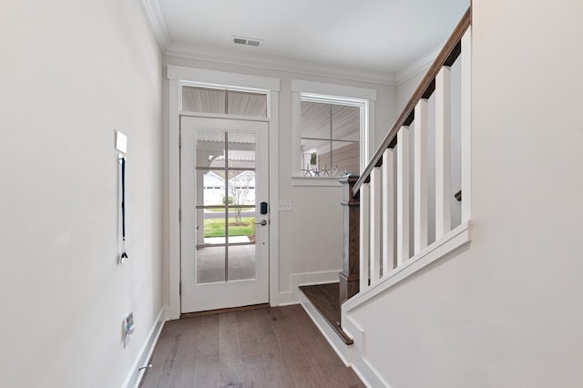 199 Old Course Loop, Cape Charles, VA 23310 - entryway featuring wood finished floors, visible vents, crown molding, baseboards, and stairs