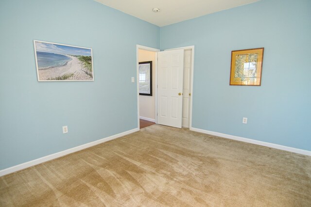 15259 Russell Dr, Onancock, VA 23417 - unfurnished bedroom featuring carpet flooring