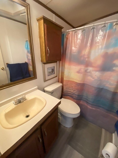 bathroom with crown molding, vanity, wood-type flooring, a shower with curtain, and toilet