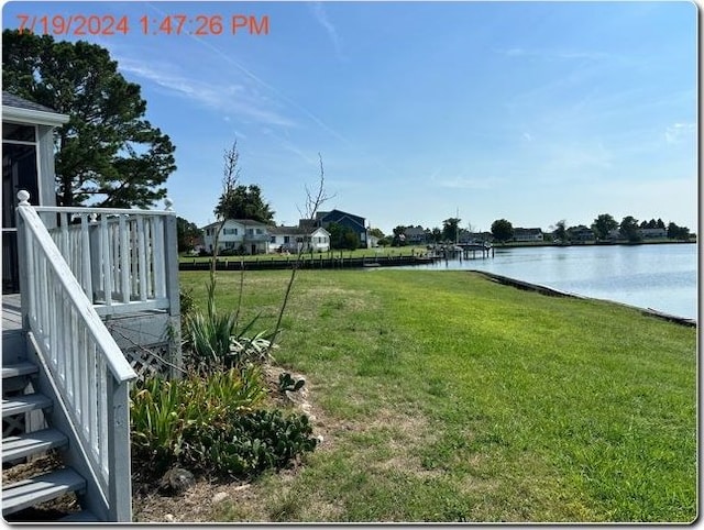 view of yard with a water view