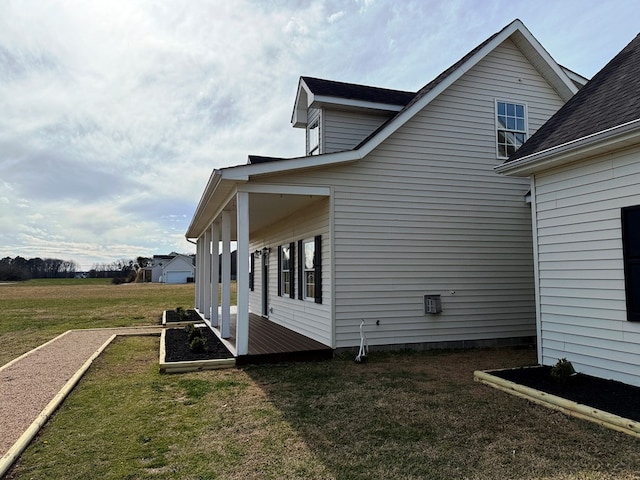 view of home's exterior featuring a lawn