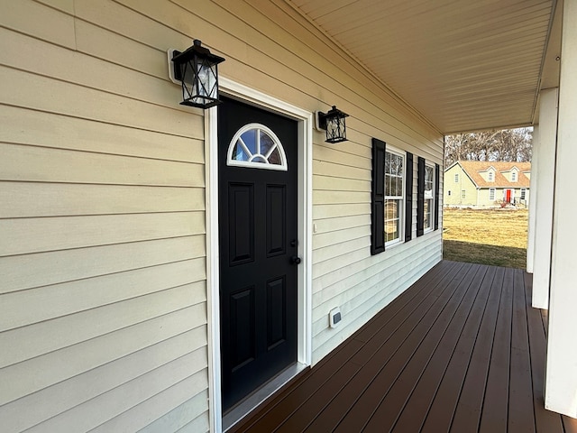 property entrance featuring covered porch