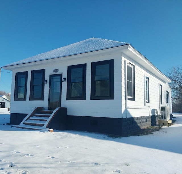 view of front facade with central air condition unit