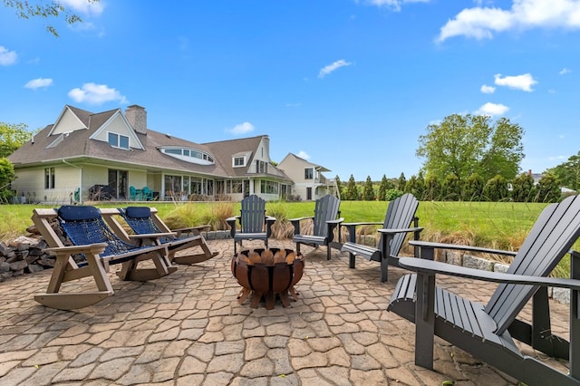 5457 Bayford Rd, Eastville, VA 23354 - view of patio / terrace featuring an outdoor fire pit