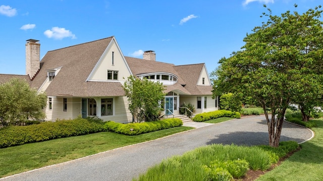 5457 Bayford Rd, Eastville, VA 23354 - view of front of property with a chimney and a front lawn