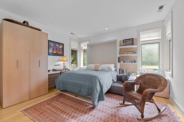 5457 Bayford Rd, Eastville, VA 23354 - bedroom with wood finished floors and recessed lighting
