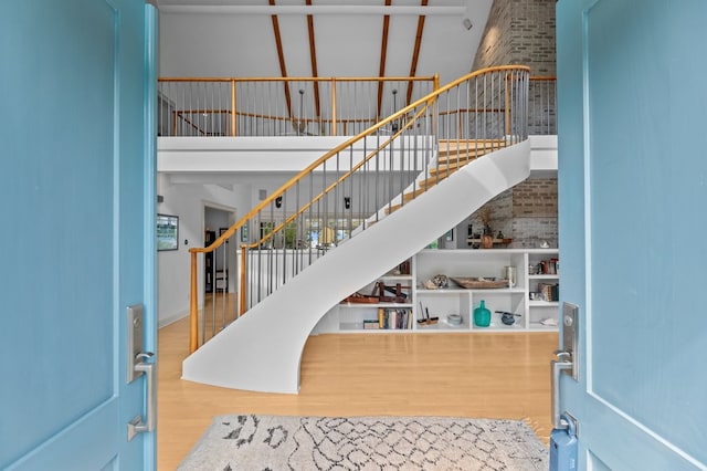 5457 Bayford Rd, Eastville, VA 23354 - entryway with a high ceiling, wood finished floors, and stairway
