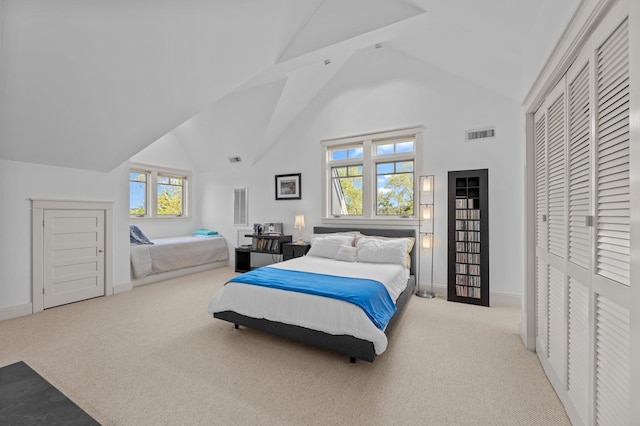 5457 Bayford Rd, Eastville, VA 23354 - bedroom featuring high vaulted ceiling, carpet flooring, baseboards, and a closet